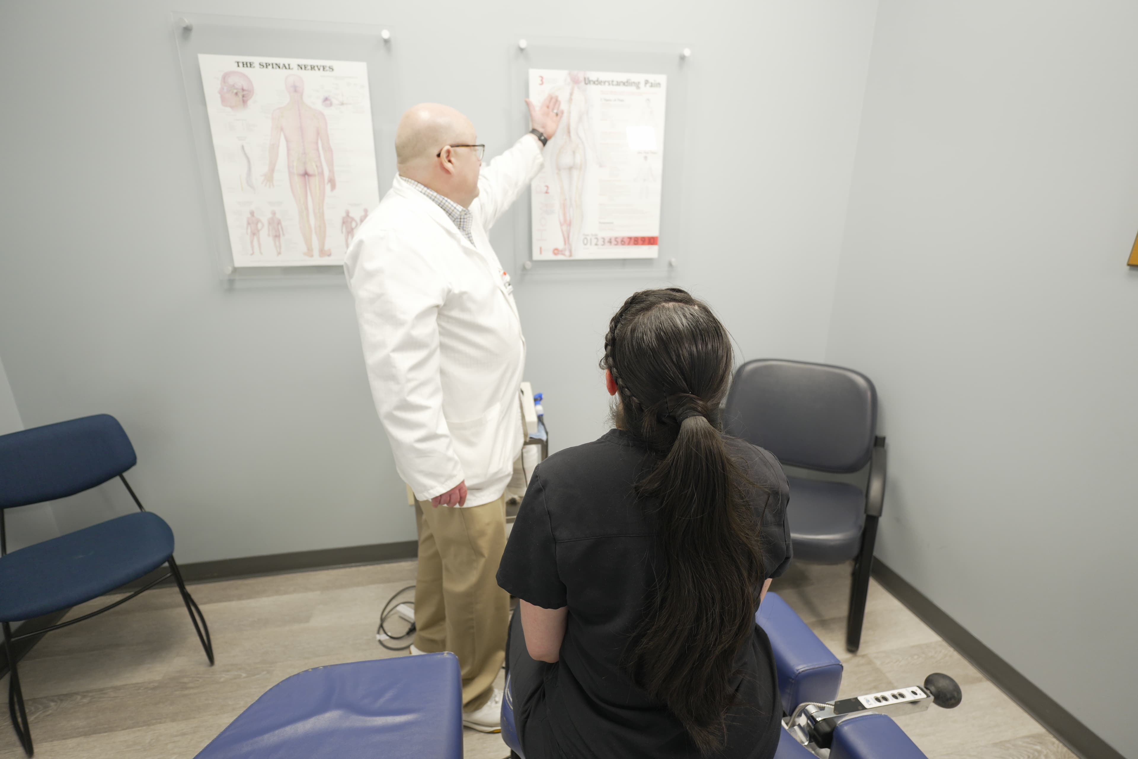 Doctor explaining anatomy to patient in consultation